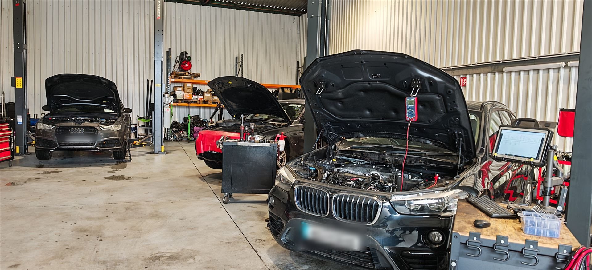 BMW X1 undergoing diagnostic testing at Car Avenue workshop in Ashbourne