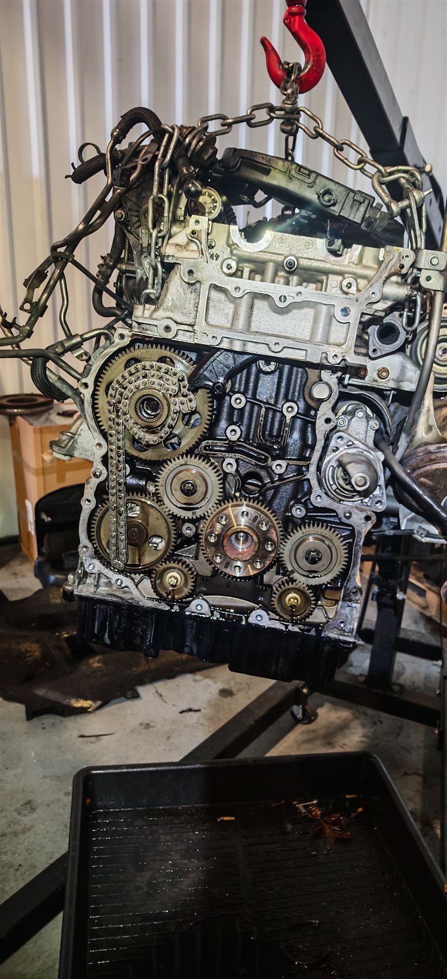 Engine rebuild with exposed timing gears at Car Avenue workshop in Ashbourne